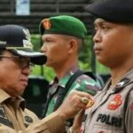 TERJUNKAN 245 Petugas, Bupati Inhil Pimpin Apel PAM Pilkades Serentak