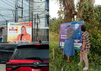 Sejumlah baliho ditutup lakban di Pekanbaru pasca dimulainya penertiban APS. F : CAKAPLAH